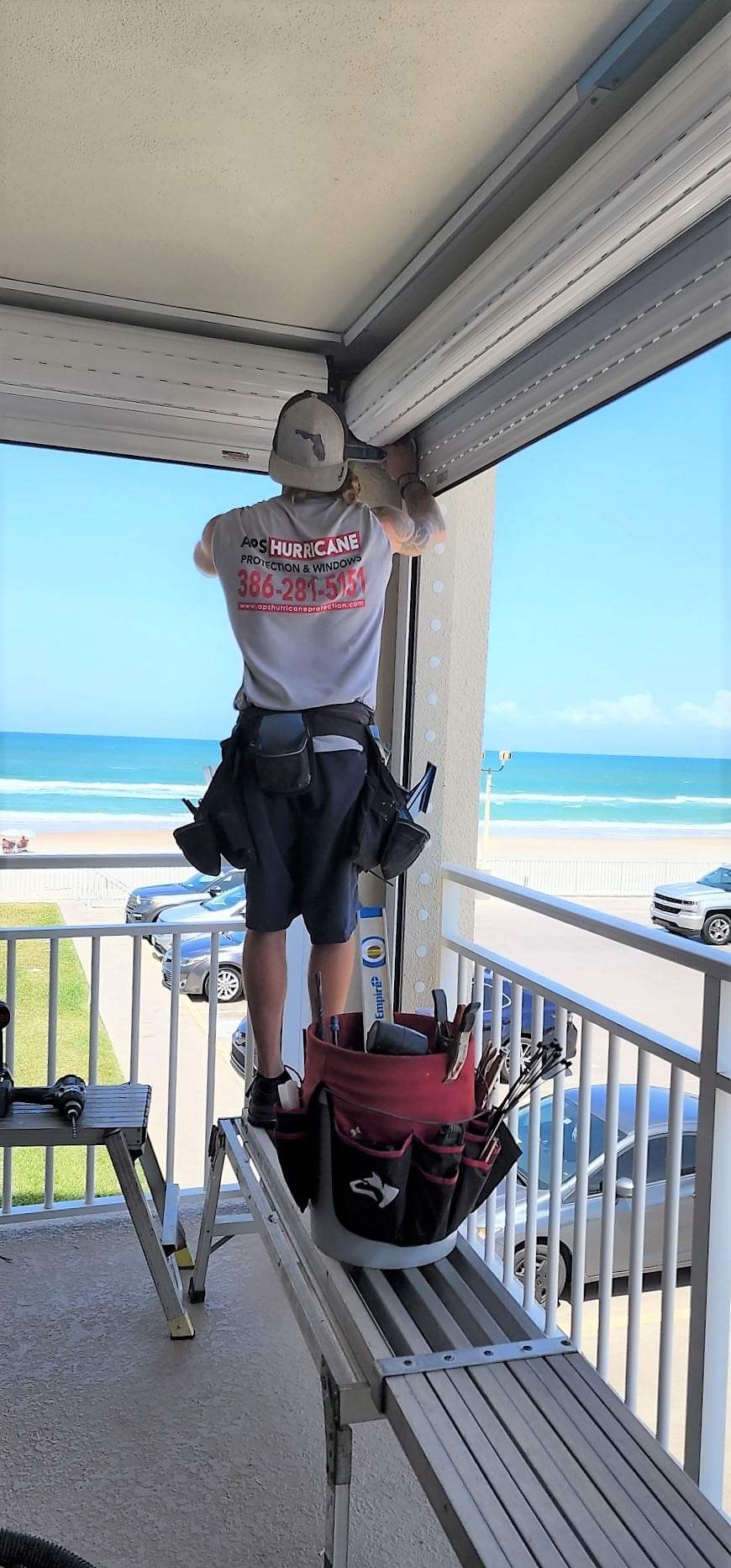 homeowner preparing property 30 days before hurricane season using a hurricane checklist